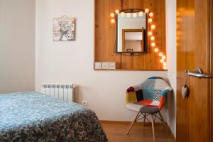 Łóżko lub łóżka w pokoju w obiekcie Apartament Cadí- Moixeró
