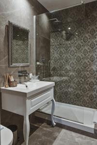 Koupelna v ubytování Garni hotel BARUT