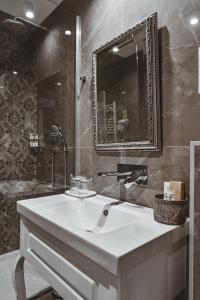 Koupelna v ubytování Garni hotel BARUT