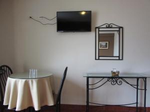 TV a/nebo společenská místnost v ubytování Hotel Bohemia