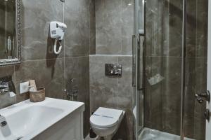 Koupelna v ubytování Garni hotel BARUT