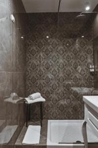 Koupelna v ubytování Garni hotel BARUT