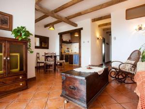 a living room with a wooden chest on a tile floor at Apartment in the middle of nature in Santa Cruz de Tenerife in San Miguel de Abona