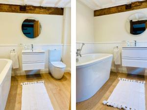 ウルバーストンにあるBank Barn at Ruslandのバスルーム(バスタブ、シンク付)の写真2枚 +22枚の写真