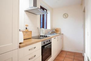 Kuchyň nebo kuchyňský kout v ubytování Honeysuckle Cottage + 6 fotografií