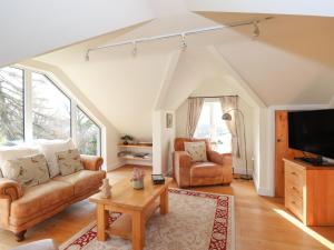 TV a/nebo společenská místnost v ubytování Highbeck Cottage