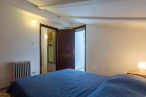 Posteľ alebo postele v izbe v ubytovaní Apartment Karigador 2534b