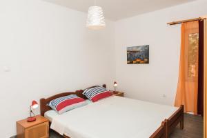 Postel nebo postele na pokoji v ubytování Family friendly house with a swimming pool Cista Velika, Vodice - 20234
