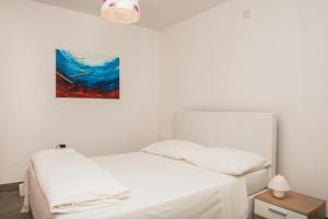 Postel nebo postele na pokoji v ubytování Family friendly house with a swimming pool Cista Velika, Vodice - 20234