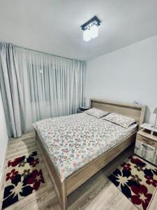 Un pat sau paturi într-o cameră la 3S Residence