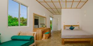 Postel nebo postele na pokoji v ubytování Jungle Beach Ahungalla
