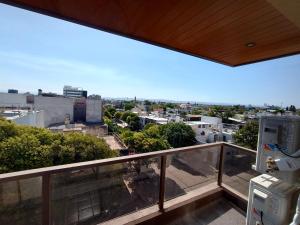 a balcony with a view of a city at Alto Tucumán in Cordoba