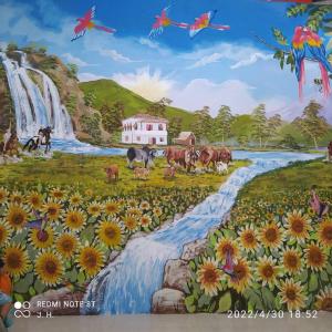 une peinture d'animaux dans un champ à côté d'une cascade dans l'établissement Casa amoblada y cómoda en BALLENITA, Santa Elena., à Ballenita