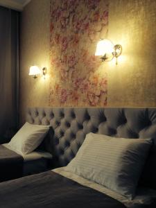 Кровать или кровати в номере Hotel POSHALE