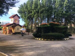 a small church with a clock tower in a park at 2 storey Camella Homes in Pagadian City in Pagadian