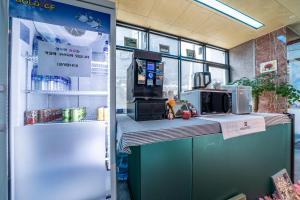 Kuchyň nebo kuchyňský kout v ubytování MG Hotel