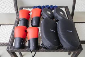 a wire rack with a group of binoculars at Sea Seeker Krabi Resort in Ao Nang Beach
