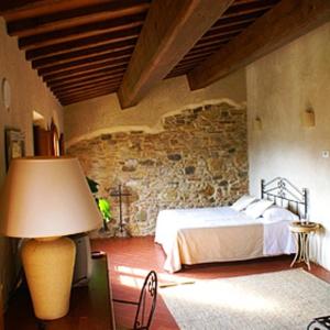 מיטה או מיטות בחדר ב-Tenuta La Borriana