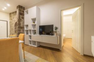TV a/nebo společenská místnost v ubytování Tuscus Apartments