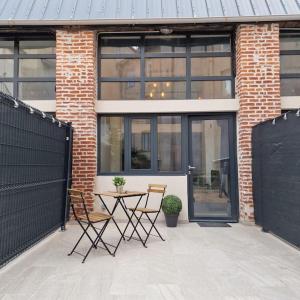 Patio alebo iná vonkajšia časť ubytovania L’atelier A magnifique Loft avec terrasse privée