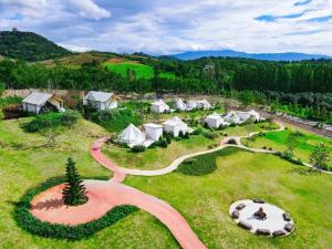an aerial view of a camp with a winding road at SOL Glamping at Khao yai in Ban Nong Makha