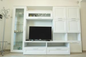 A television and/or entertainment centre at Le Villette - Taormina