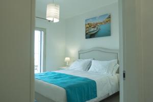 A bed or beds in a room at Le Villette - Taormina