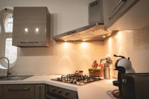 A kitchen or kitchenette at Le Villette - Taormina