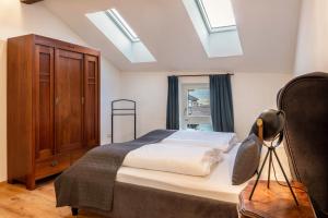 Ένα ή περισσότερα κρεβάτια σε δωμάτιο στο Eichhof Apartment Wacholder
