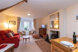 Posezení v ubytování Swinside Cottage