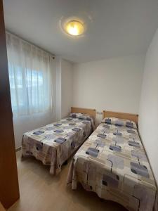 Posteľ alebo postele v izbe v ubytovaní Alpen1 Pompeya