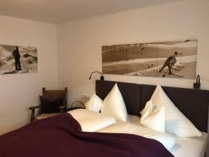 Łóżko lub łóżka w pokoju w obiekcie Chalet Karin