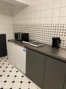 a kitchen with a counter and a counter top at Ferienzimmer Nr.20 in Bad Neuenahr-Ahrweiler