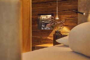 Rúm í herbergi á Bauernhof Hotel Oberschwarzach