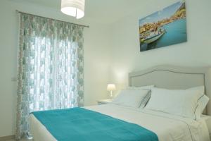 A bed or beds in a room at Le Villette - Taormina