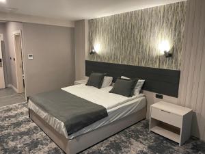Postel nebo postele na pokoji v ubytování Yeşilyurt Park Otel