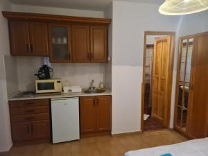 Kuchyňa alebo kuchynka v ubytovaní Mediterrán Apartman és Vendégház
