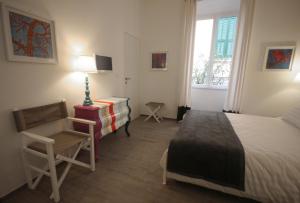 A bed or beds in a room at Ca' de Tobia