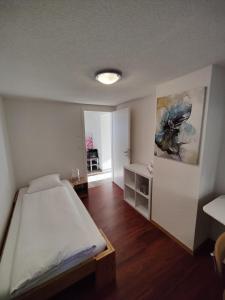 Postel nebo postele na pokoji v ubytování Hubel Apartment 14