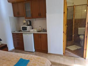 Kuchyňa alebo kuchynka v ubytovaní Mediterrán Apartman és Vendégház
