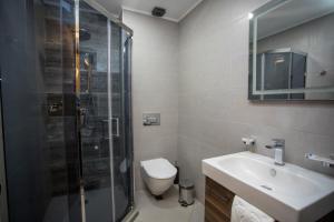 Koupelna v ubytování Hotel London