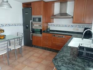 Kuchyňa alebo kuchynka v ubytovaní Acogedora y confortable casa familiar en L'Olleria