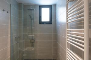 Koupelna v ubytování Greek Sky - New modern apartment with shared pool