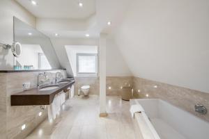 Koupelna v ubytování Hotel Garni Christine