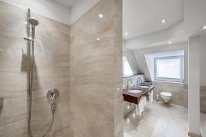 Koupelna v ubytování Hotel Garni Christine