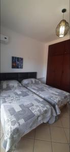 Postel nebo postele na pokoji v ubytování Apprt hôtel cabo dream 99