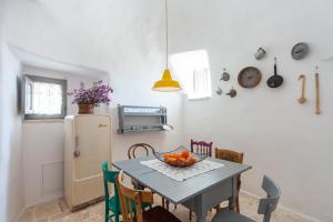 A cozinha ou kitchenette de Trulli 18cinquantanove