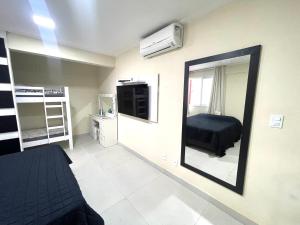Postel nebo postele na pokoji v ubytování Cobertura Luxo com Jacuzzi Orla Praia Grande
