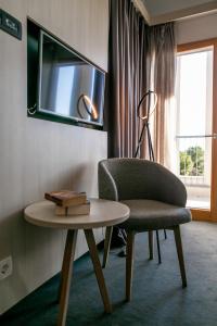 TV a/nebo společenská místnost v ubytování Hotel Salona Palace