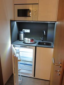 Kuchyň nebo kuchyňský kout v ubytování Apartmány 45 Valča